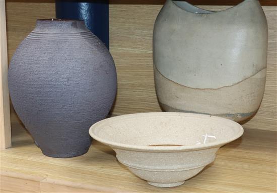 A black stoneware vase and two other items of Studio pottery, all with impressed marks